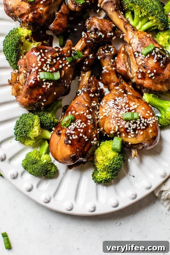 Sticky Asian Glazed Chicken Drumsticks Recipe 7 Asian chicken on a plate with broccoli