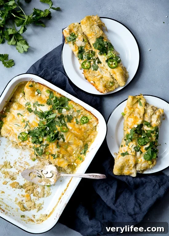 Creamy Salsa Verde Chicken and White Bean Enchiladas 3 White beans, shredded chicken, green chiles, sour cream and cheese – need I say more?