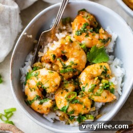 Creamy Red Thai Coconut Curry Shrimp 5 Thai Coconut Curry Shrimp in a bowl with rice.