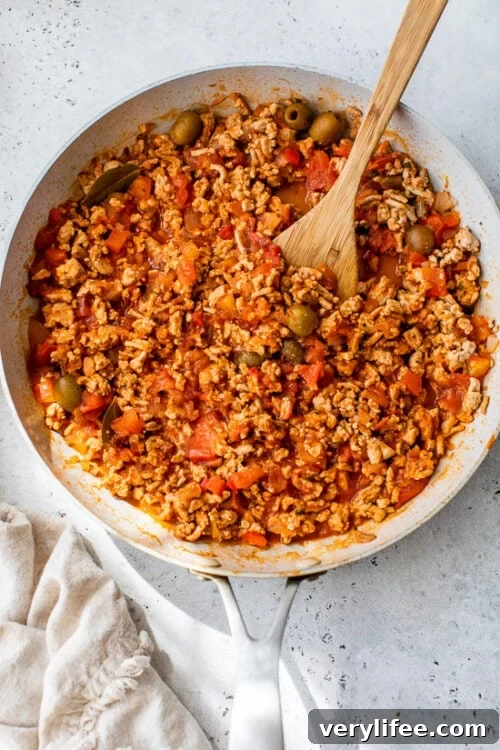 Cooked picadillo in a skillet