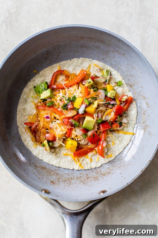 How to Make Crispy Chicken Quesadillas 6 Chicken Quesadilla in skillet