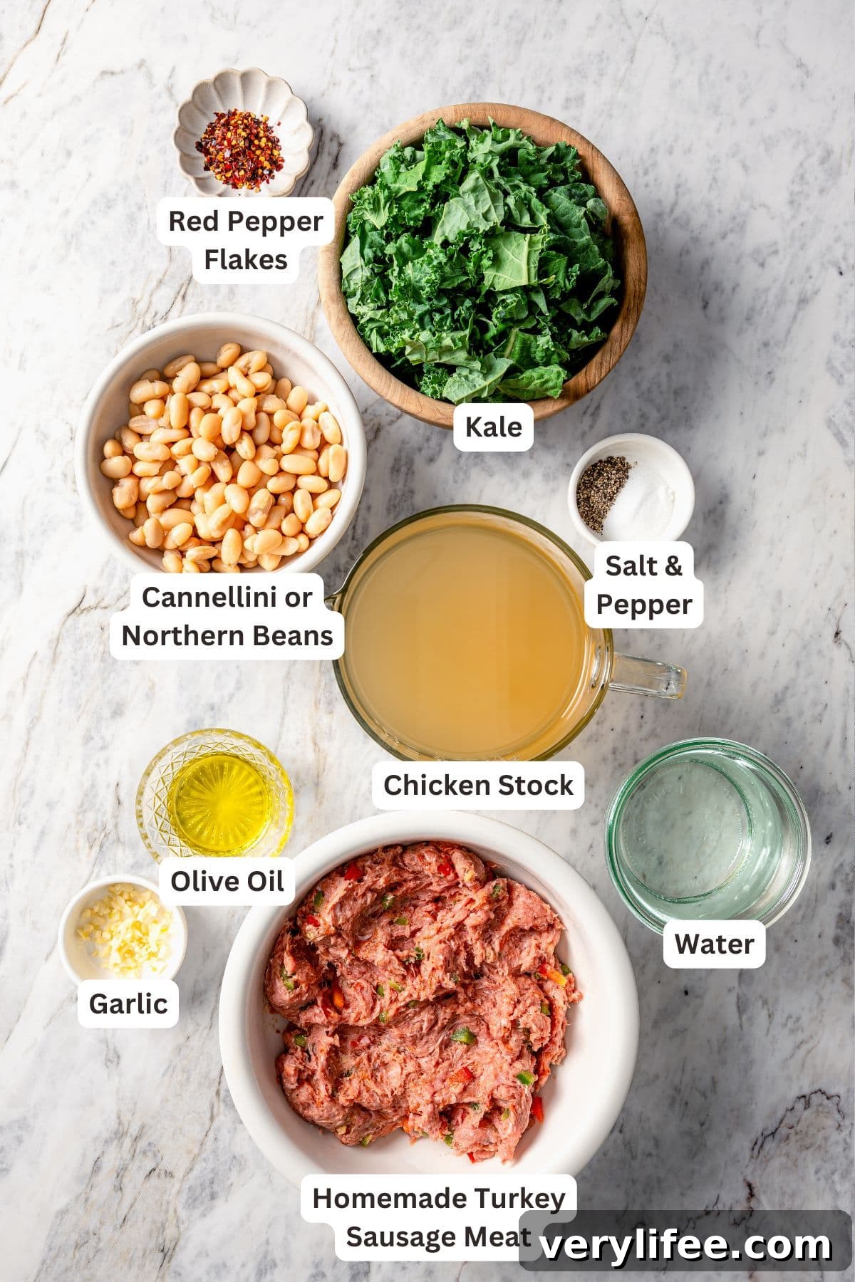 Ingredients for white bean soup with sausage and kale.