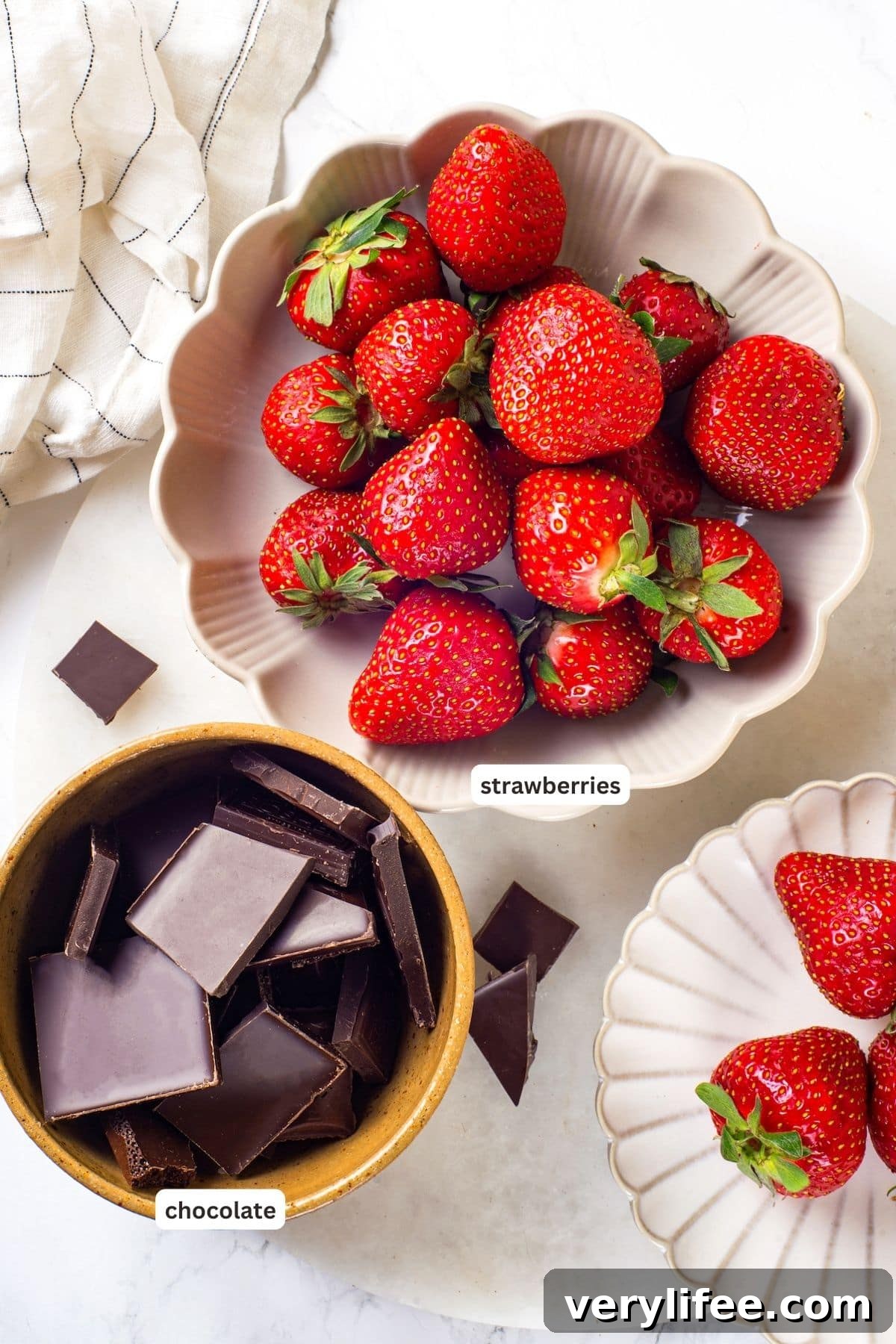 Chocolate-covered strawberries ingredients Overhead view of ingredients for chocolate-covered strawberries with labels