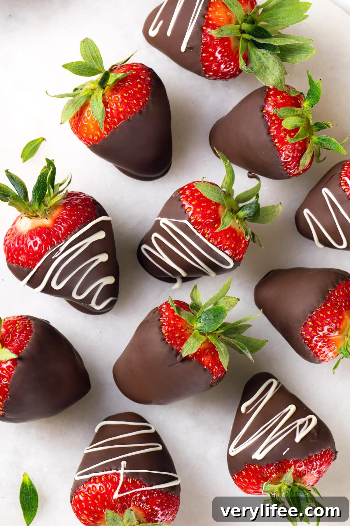 Chocolate-covered strawberries ready to serve Overhead view of chocolate strawberries on countertop