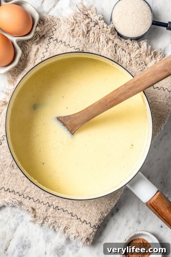 Overhead view of homemade eggnog in pan