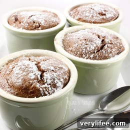 Chocolate banana soufflés in ramekins