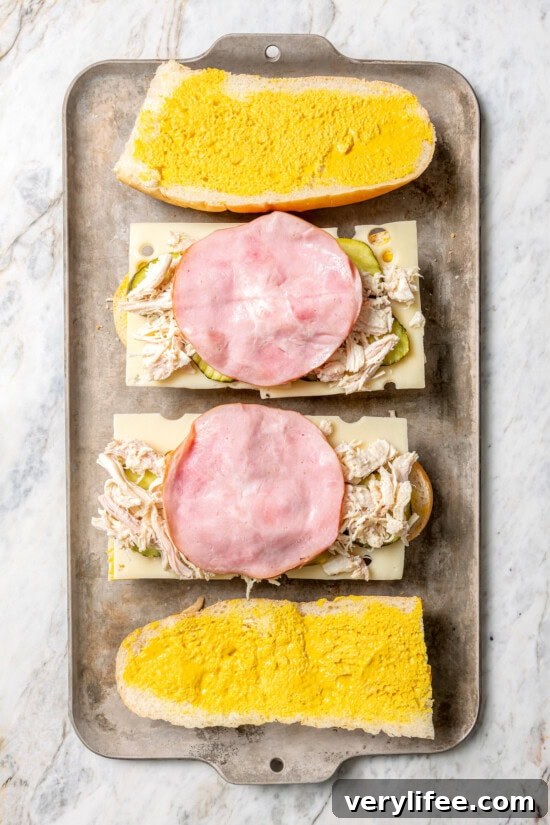 Overhead view of Cuban turkey sandwiches being assembled
