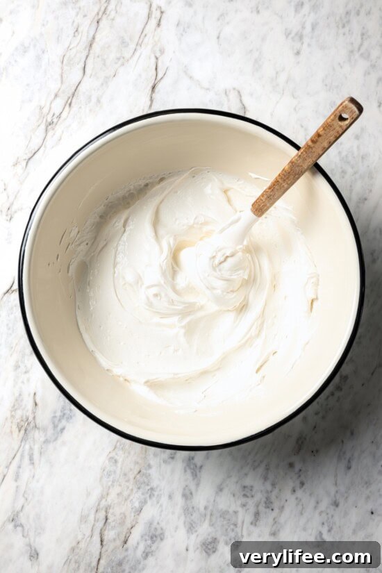 No-Bake Banana Cream Pie Recipe 7 Filling for banana cream pie in mixing bowl.