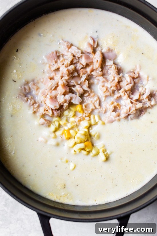 Lightened-Up Clam Chowder Recipe 5 This lighter Clam Chowder, full of canned clams, potatoes, and corn, is still creamy but with less fat than most other versions.