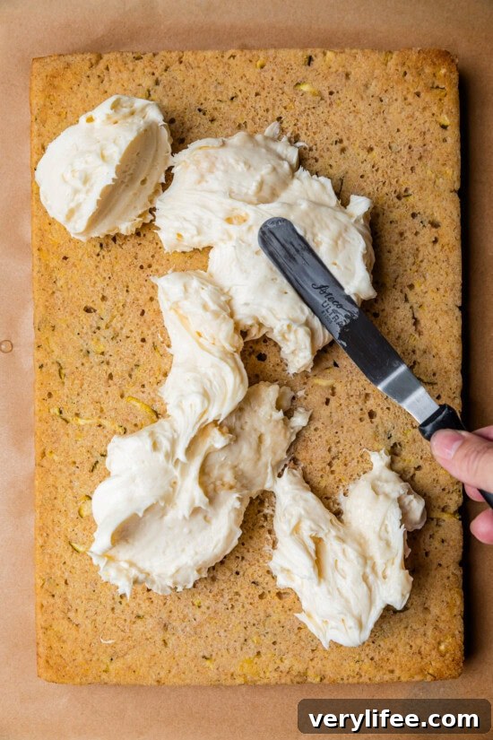 When the cake is cool, frost the cake