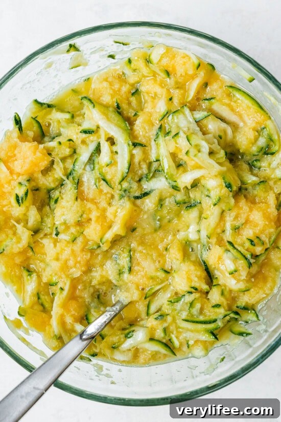 Combine the zucchini and remaining wet ingredients in another bowl.