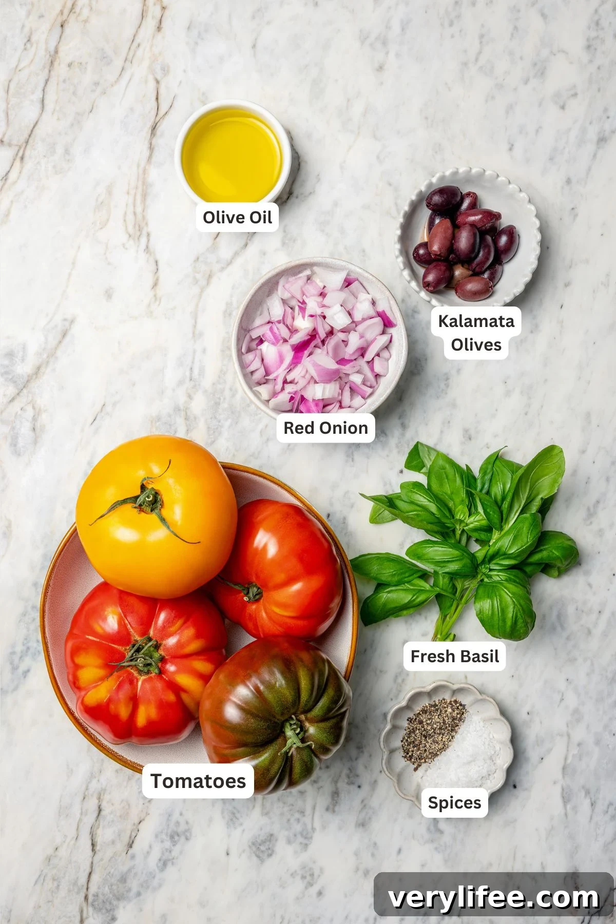 Overhead view of ingredients for heirloom tomato salad
