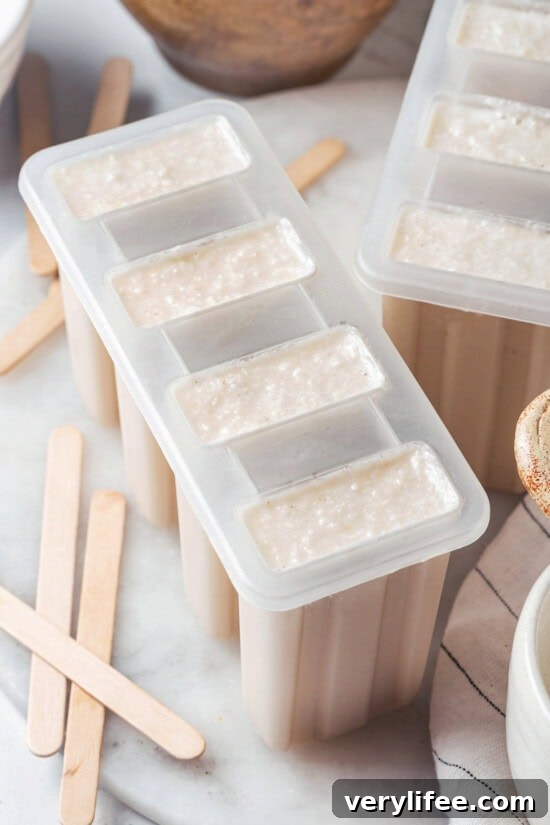 Freeze in popsicle molds. Coconut pop mixture in popsicle mold