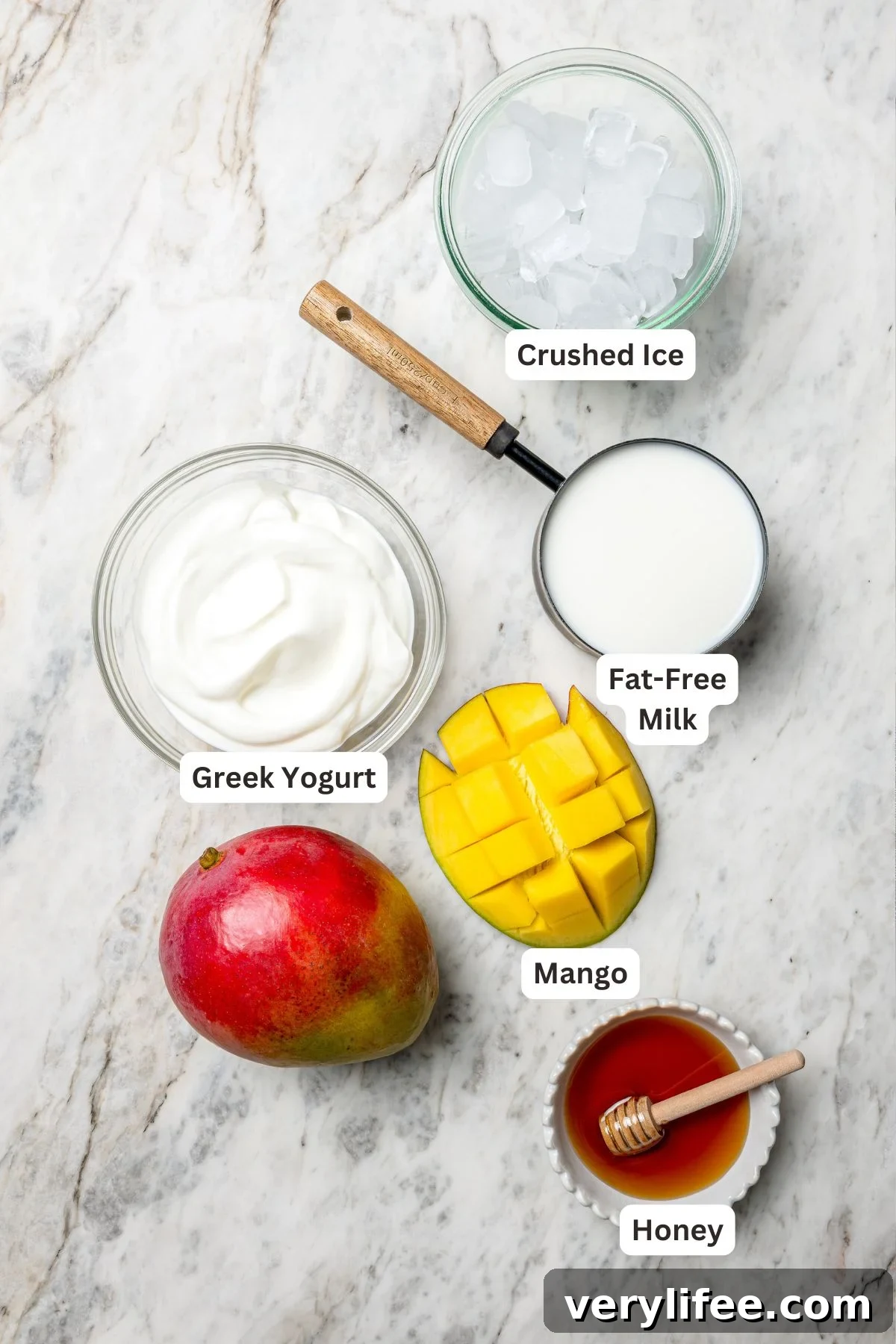 Overhead view of ingredients for mango lassi