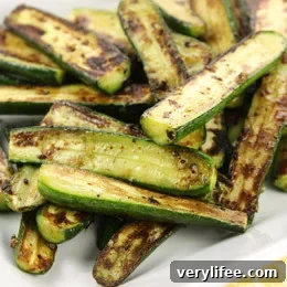 Pan-Sauteed Baby Zucchini with Garlic and Herbs 2 Sauteed baby zucchini in a pan