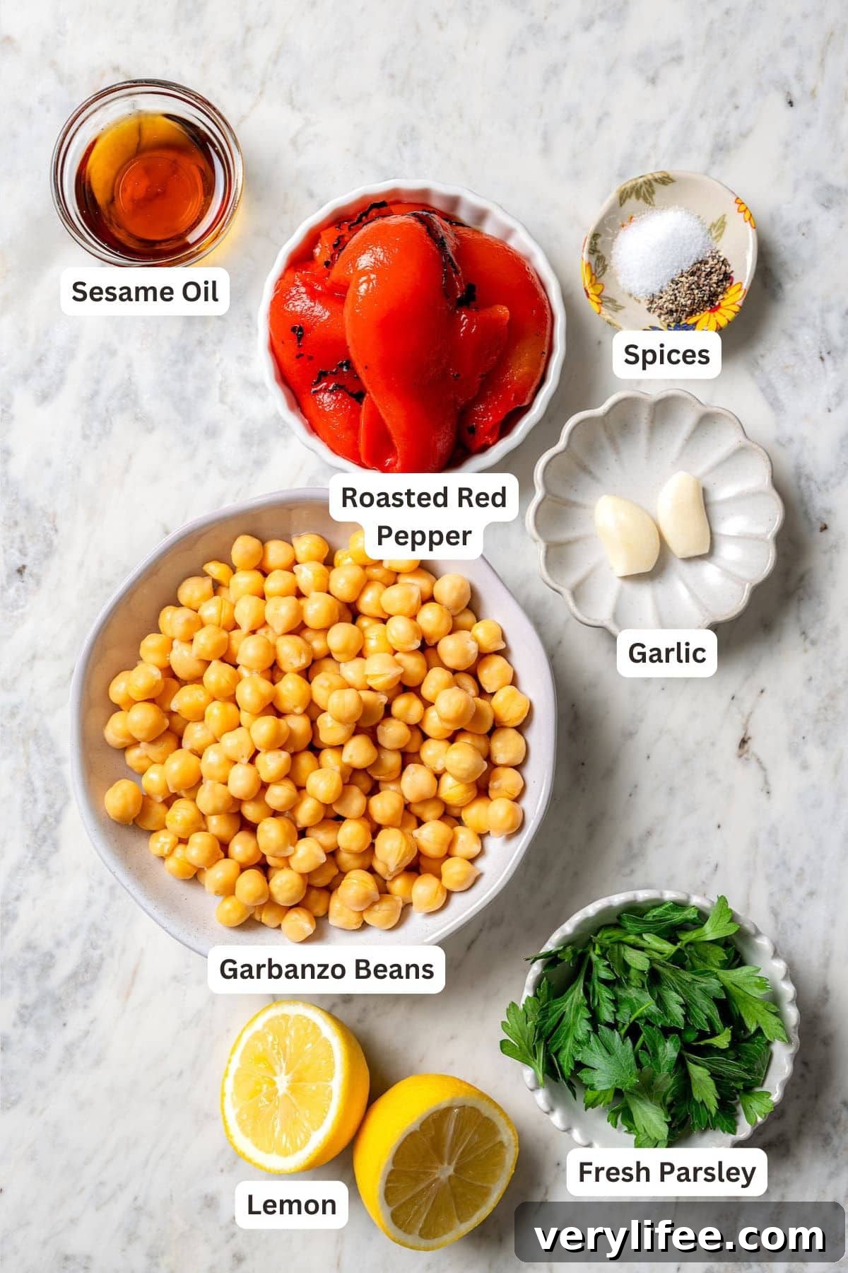 Overhead view of ingredients for roasted red pepper hummus