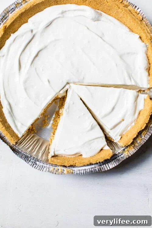 Creamy No-Bake Cheesecake Recipe 3 Overhead view of sliced no-bake cheesecake