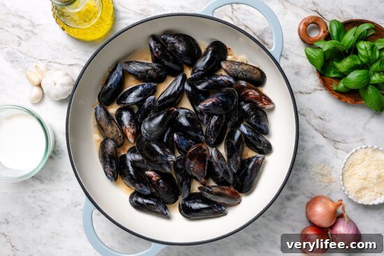 Creamy Basil Mussels Recipe 7 Skillet of mussels.