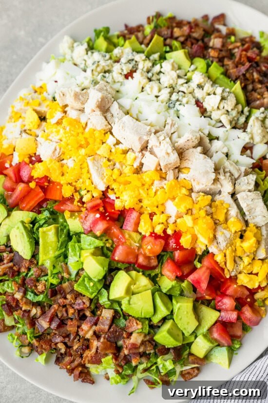 Arrange the salad ingredients Easy Cobb salad recipe on serving plate