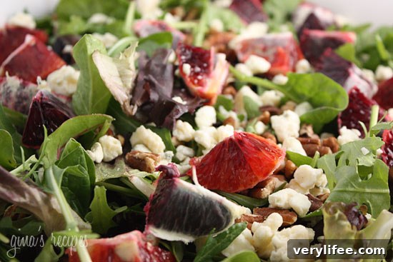 Blood Orange, Gorgonzola and Pecan Salad with Baby Greens 2 Mixed greens topped with crumbled gorgonzola cheese, chunks of blood orange and chopped pecans