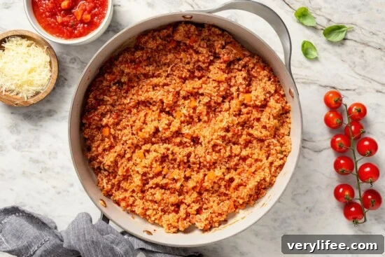Quinoa risotto in skillet.