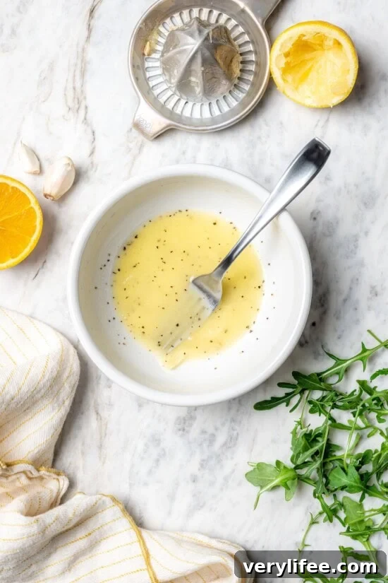 Overhead view of mojo vinaigrette in bowl with fork