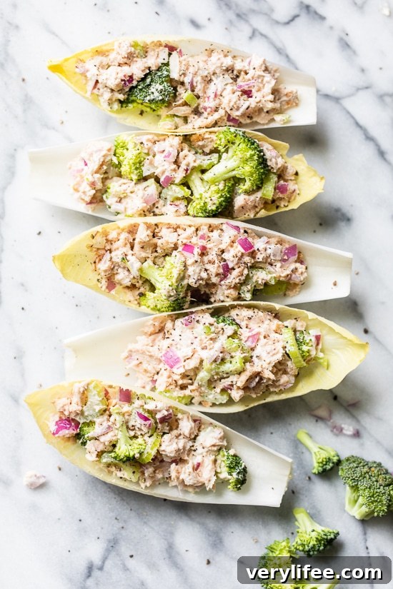 Tuna Salad loaded with veggies served in endive leaves make a quick and easy, low-carb lunch.
