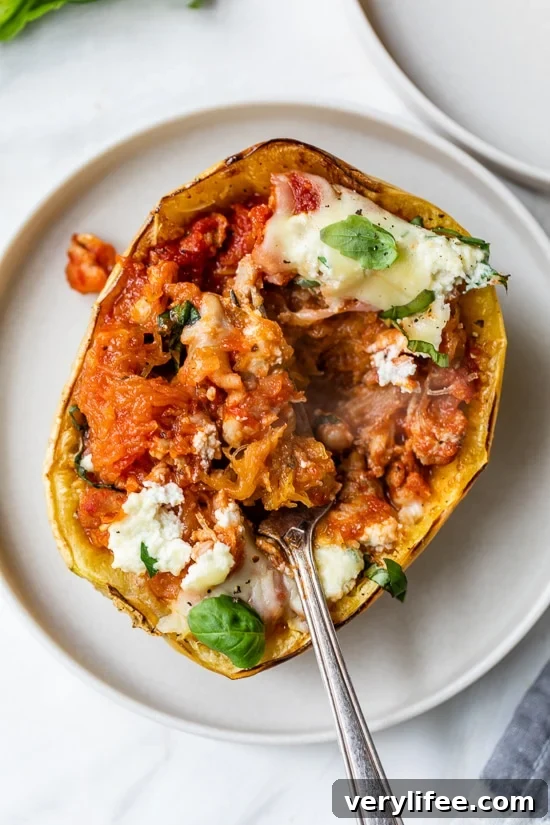 How to Roast Spaghetti Squash Perfectly 5 Roasted Spaghetti Squash on a white plate