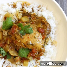 This easy Chicken Curry dish with potatoes, garam masala, cumin and curry spices and simmered with coconut milk.