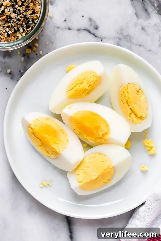Perfect hard boiled eggs Overhead view of quartered hard boiled eggs on plate