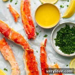 King Crab Legs with butter and lemon wedges
