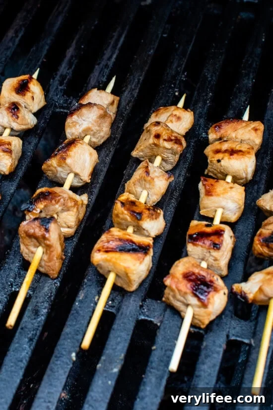 pork kebabs on grill