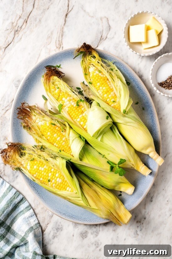 How to Cook Corn on the Cob in the Microwave 5 Peeling husk from microwaved corn on the cob.