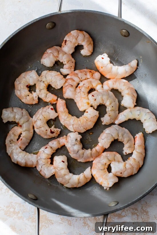 Pan-Seared Shrimp with Garlic Butter and Lemon 6 shrimp in skillet
