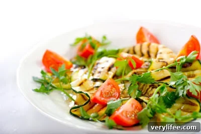 Grilled zucchini and tomato salad