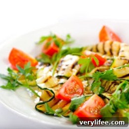 Grilled zucchini ribbons with tomatoes