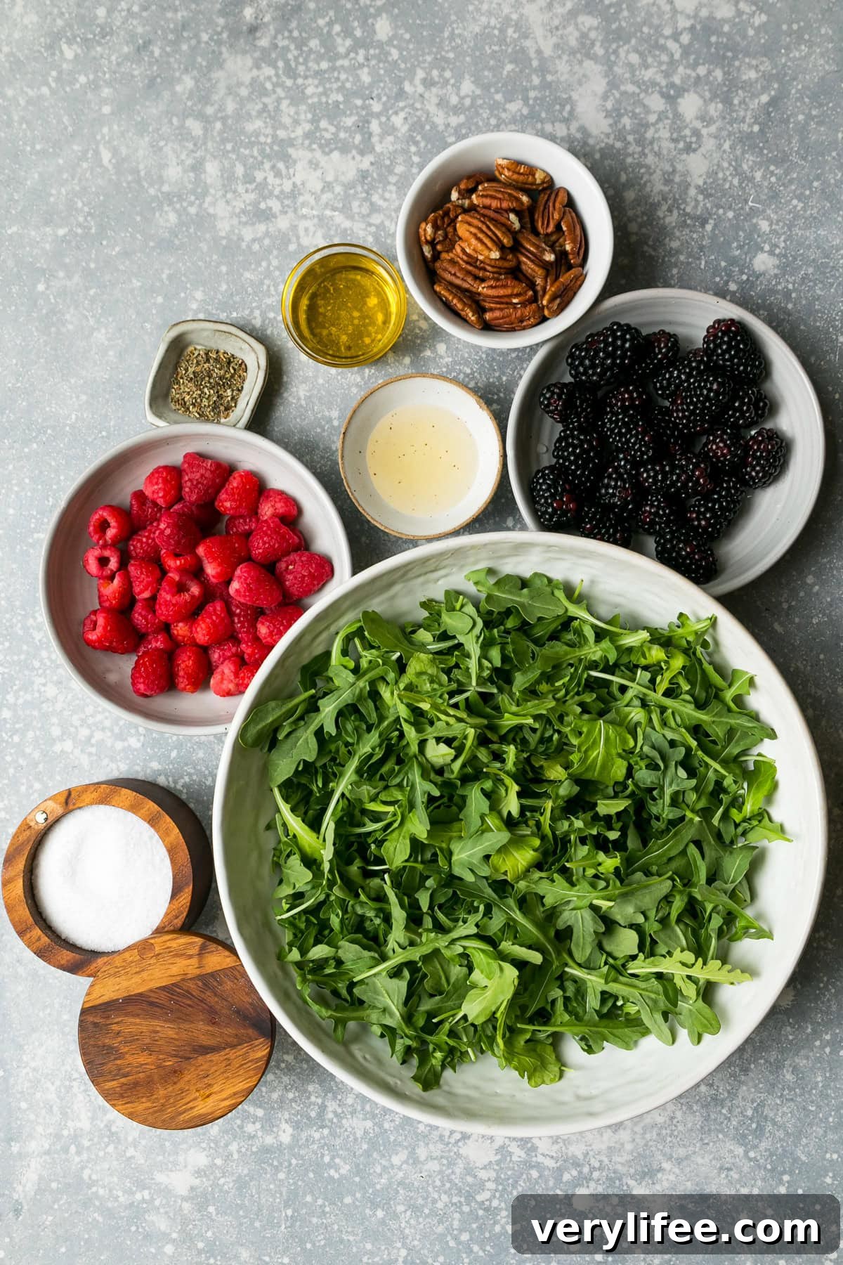 Arugula, blackberries, blueberries and pecans