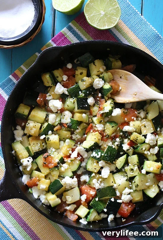Mexican zucchini in a cast iron skillet
