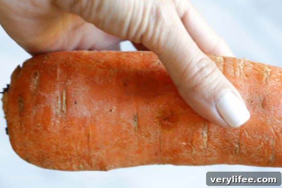 An easy 5-ingredient carrot salad that is lemony, bright and delicious! You don't need a spiralizer to make it, you can use pre-shredded carrots or use a potato peeler to cut the carrots into ribbons.