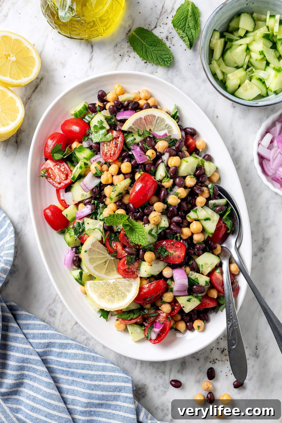 Garbanzo bean Mediterranean salad on serving platter.
