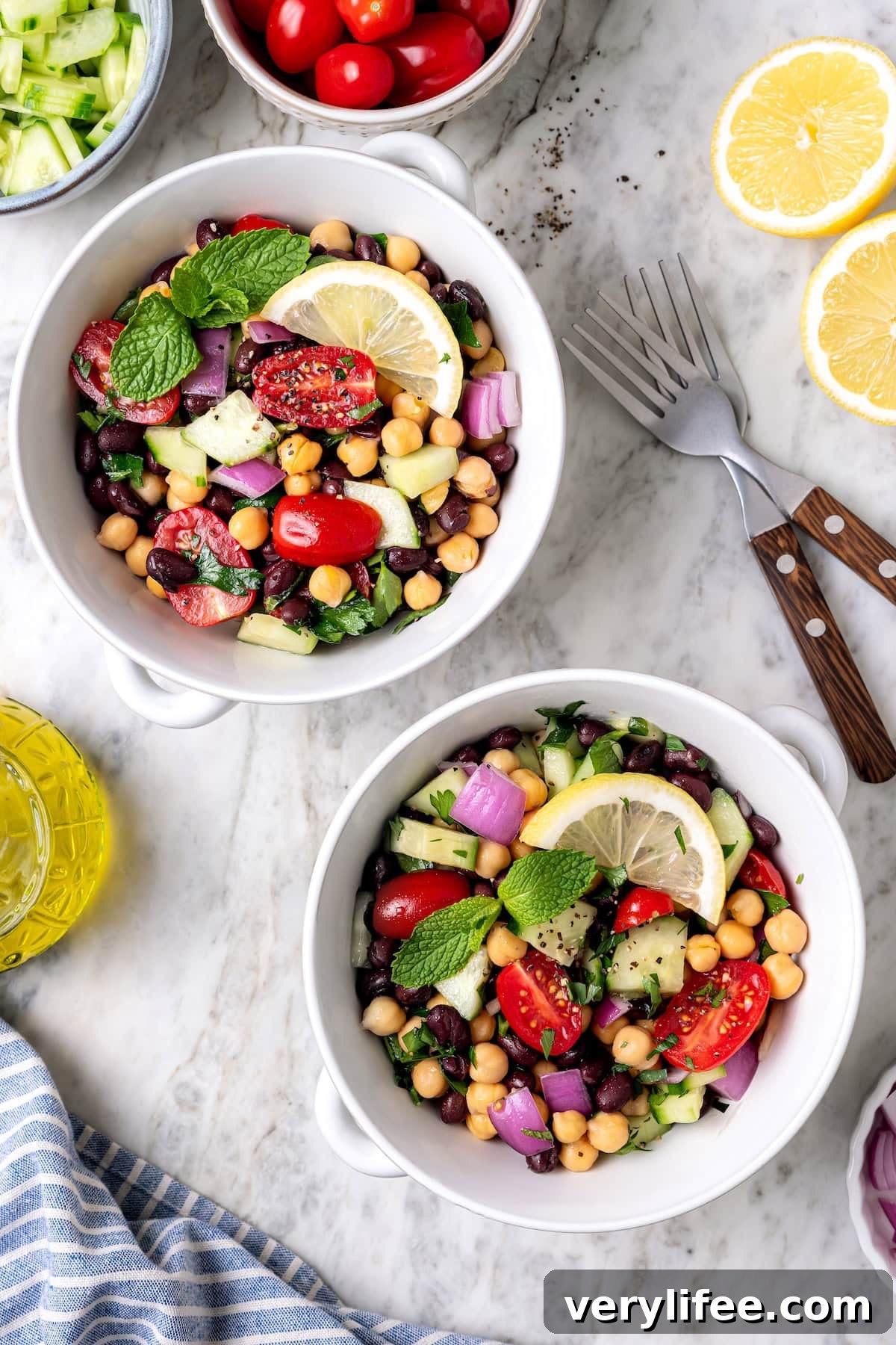 Garbanzo bean Mediterranean salad in two bowls.