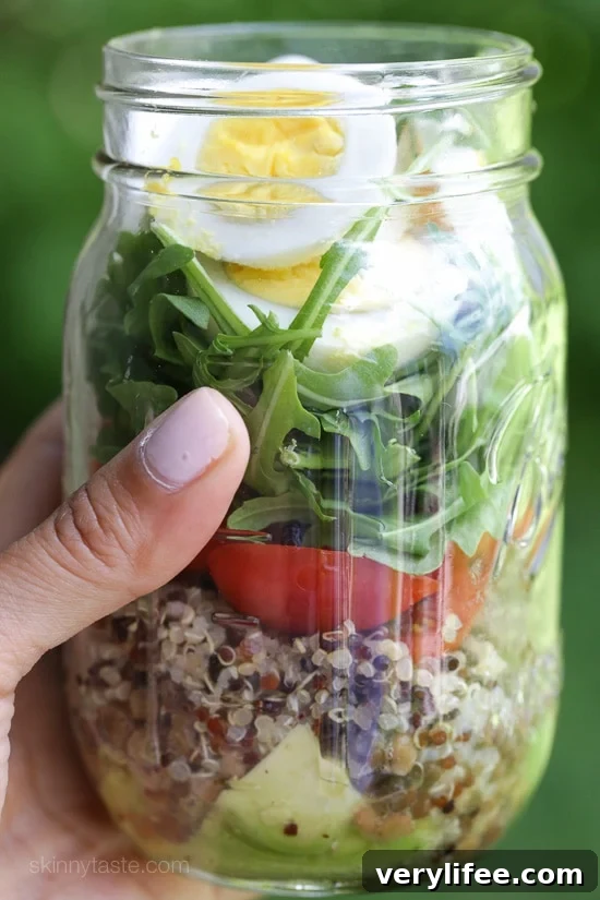 Protein-Packed Egg and Quinoa Salad Jars 3 A protein-packed meatless salad in a jar made with quinoa, lentils, arugula, avocado and hard boiled eggs are perfect to pack for work, the beach, picnics, or anywhere you need a portable lunch on the go.