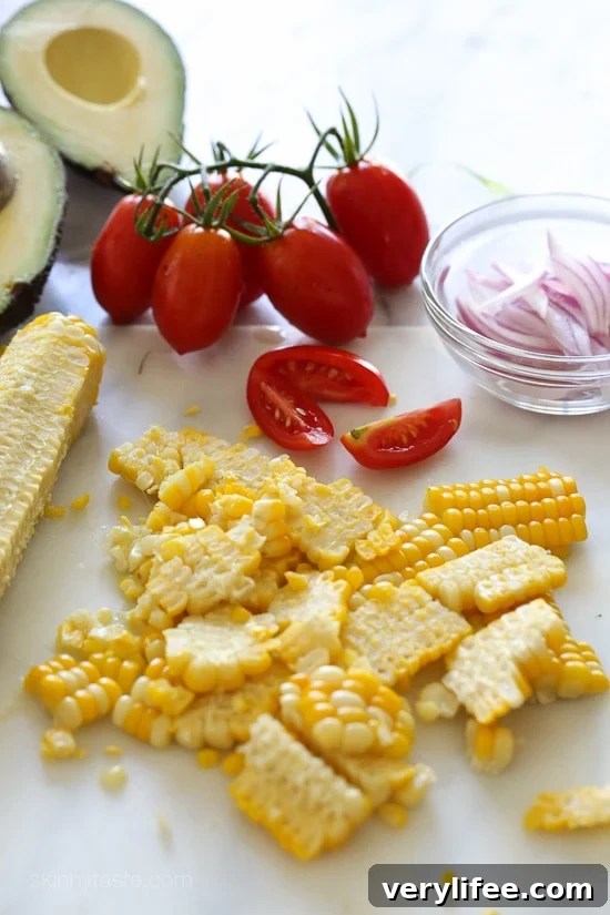 Corn, Tomato & Avocado Salad with Creamy Buttermilk Dressing 3 Summer Corn, Tomato and Avocado Salad are delicious topped with a Buttermilk-Dijon Dressing, goes great with anything you're grilling!