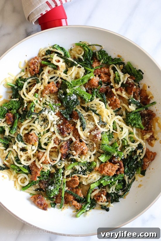 Finished Broccoli Rabe and Sausage Parsnip Spiralized Pasta plated and ready to serve.