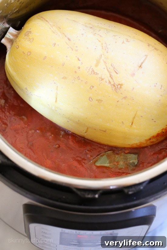 One-Pot Spaghetti Squash Meat Sauce for Pressure or Slow Cooker 3 Make this easy, healthy Spaghetti Squash AND Meat Sauce all at the same time with this delicious one-pot meal ready in under thirty minutes when made in the pressure cooker or slow cooker! This is the easiest way to make spaghetti squash whole, no cutting before it's cooked, just poke some holes all over and cook it!