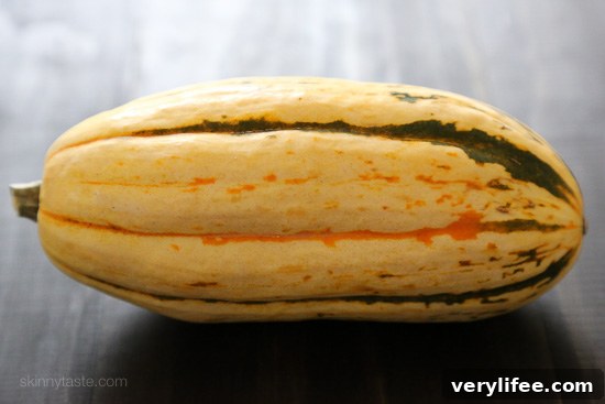Roasted Delicata Squash with Turmeric Recipe 3 Sliced delicata squash ready for roasting.
