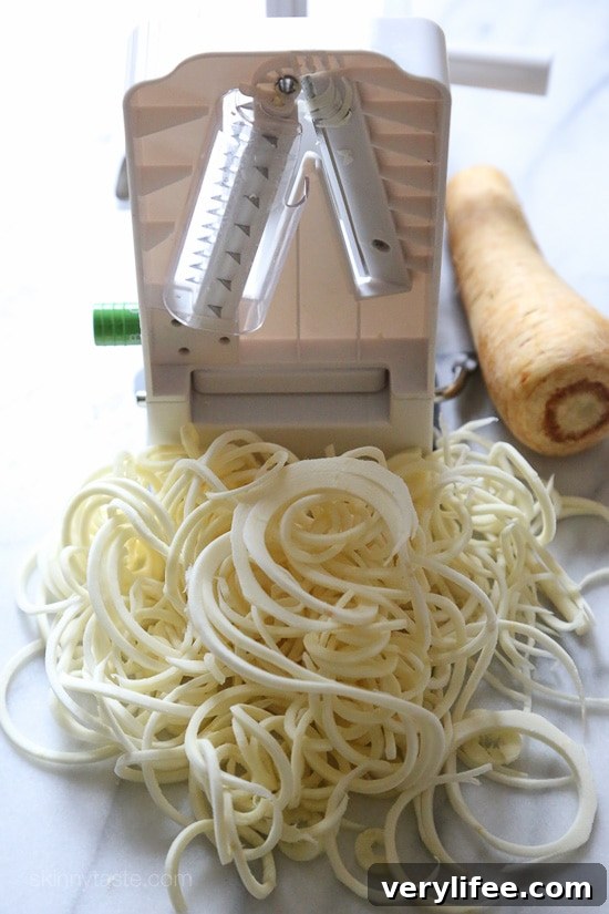 Spiralized Parsnip Pasta with Sausage and Brussels Sprouts 4 Spiralized parsnips make a wonderful pasta replacement in this spicy Autumn dish made with brussels sprouts and spicy chicken sausage.