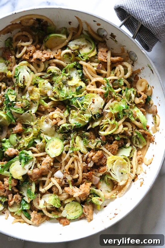 Spiralized Parsnip Pasta with Sausage and Brussels Sprouts 5 Spiralized parsnips make a wonderful pasta replacement in this spicy Autumn dish made with brussels sprouts and spicy chicken sausage.
