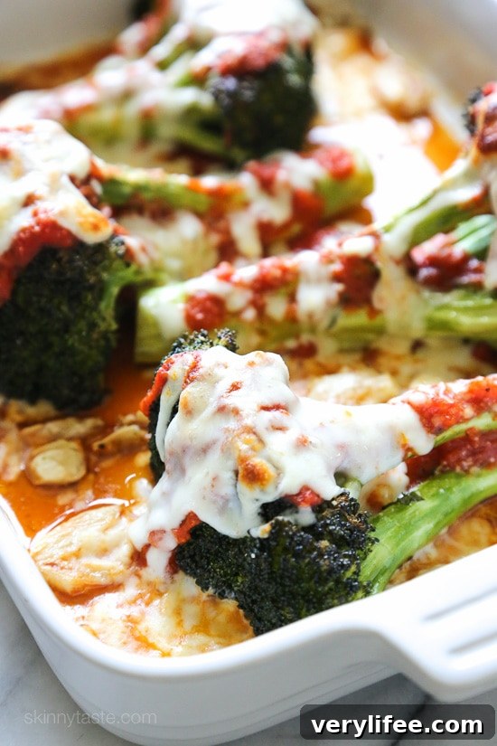 Roasted broccoli topped with marinara and melted cheese