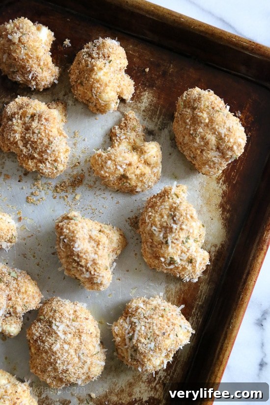 Oven-Baked Cauliflower Nuggets with Garlic-Parmesan Dip 4 Crispy cauliflower florets ready to serve